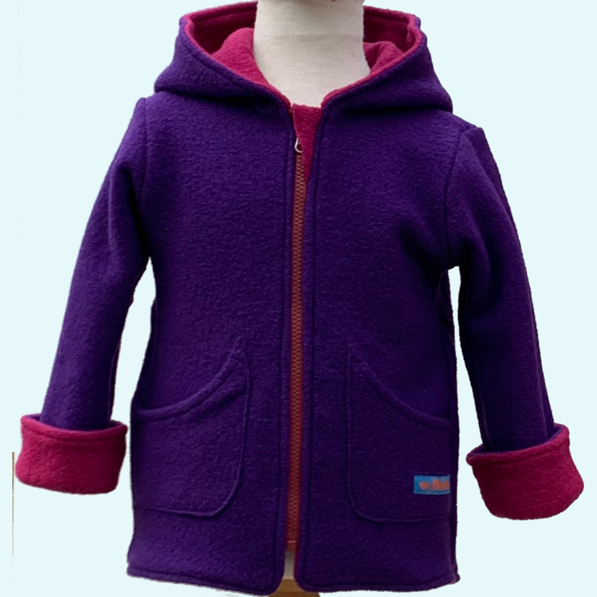 Doubleface Walkjacke für Mädchen aus 100% Schurwolle von Wollkids - Farbe lila/beere